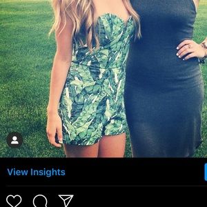 Strapless romper with palm tree print